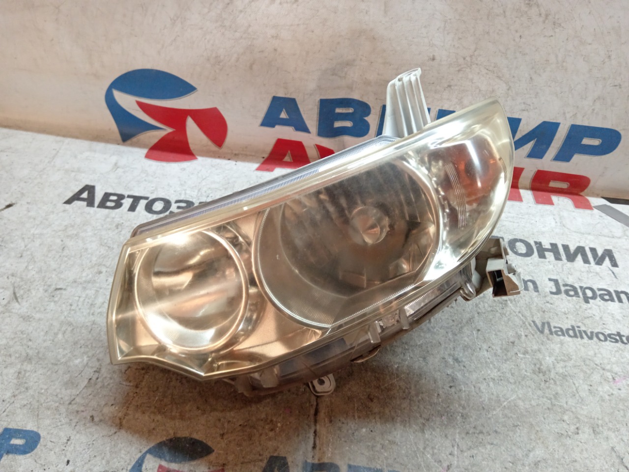 Фара DAIHATSU TANTO L375S передняя левая (б/у)