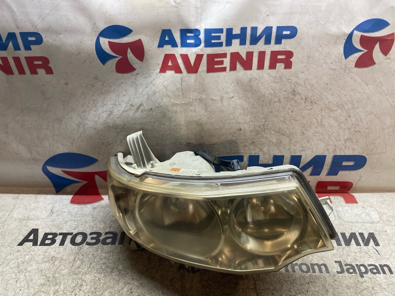 Фара DAIHATSU TANTO L375S передняя левая (б/у)