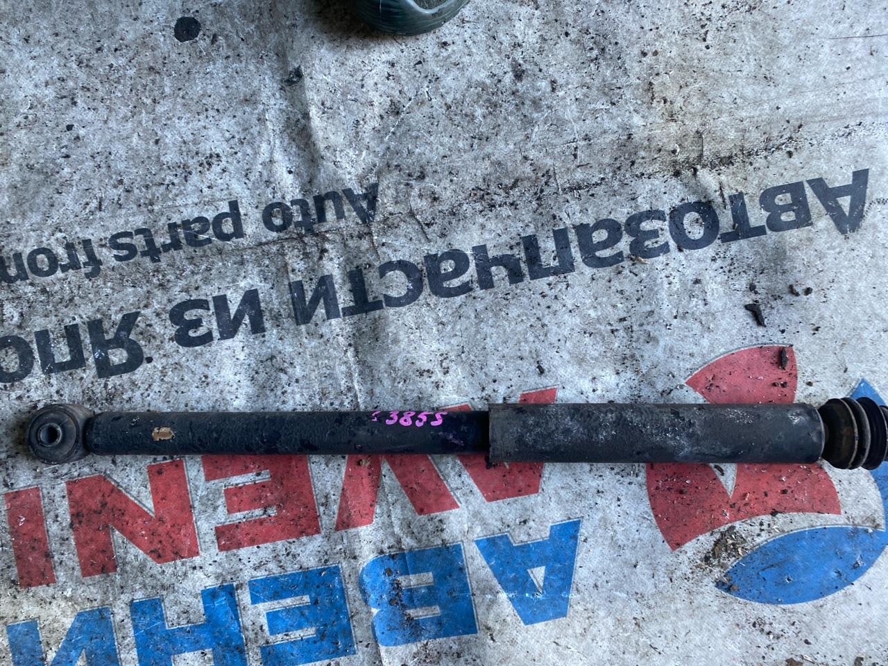 Амортизатор DAIHATSU TANTO L385S задний (б/у)