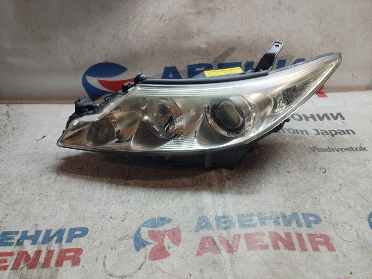 Фара TOYOTA ESTIMA ACR55 передняя левая (б/у)