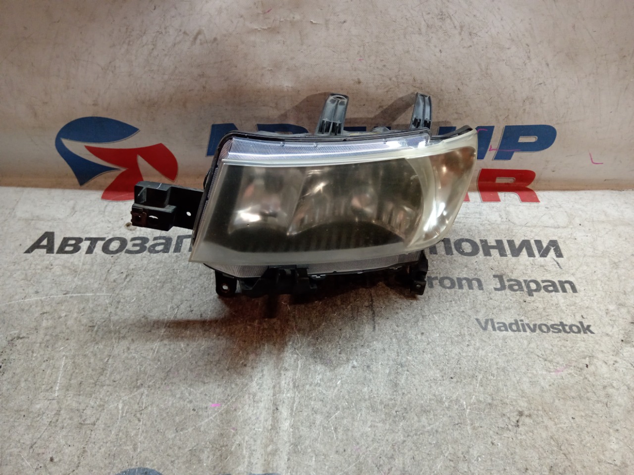 Фара TOYOTA BB QNC25 передняя левая (б/у)