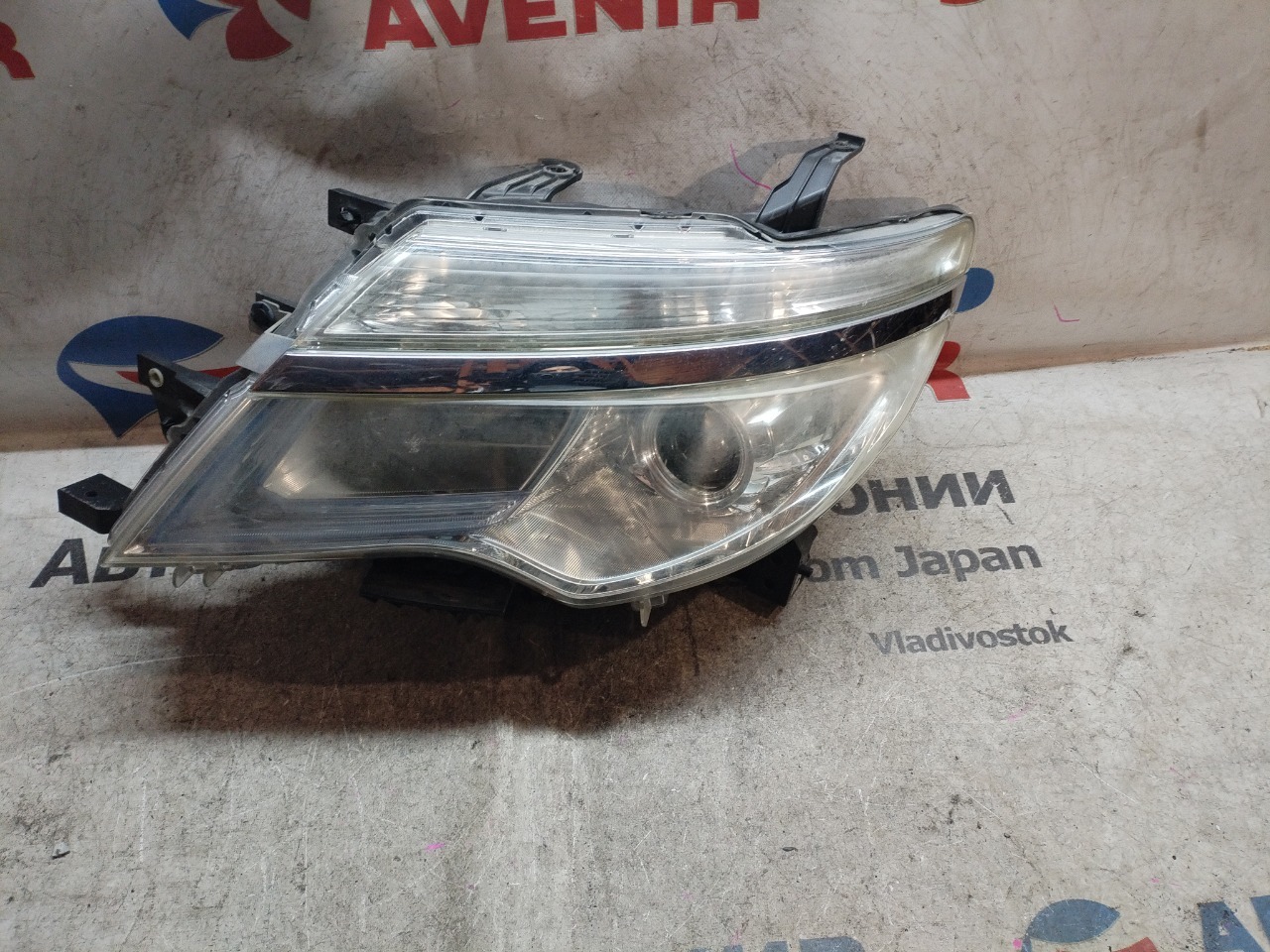 Фара NISSAN SERENA HC26 передняя левая (б/у)