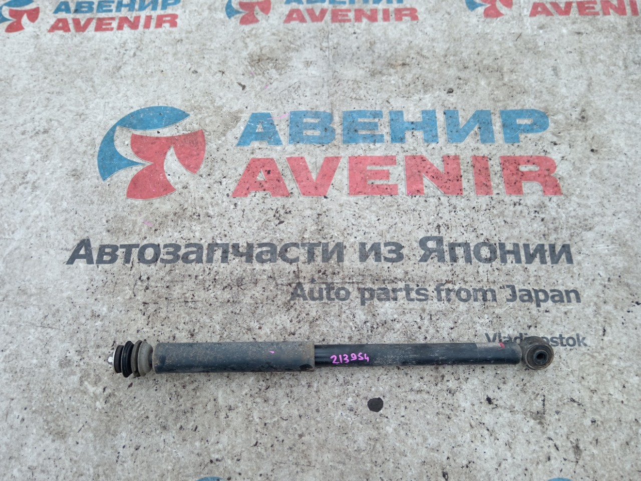 Амортизатор DAIHATSU MOVE LA160S задний (б/у)