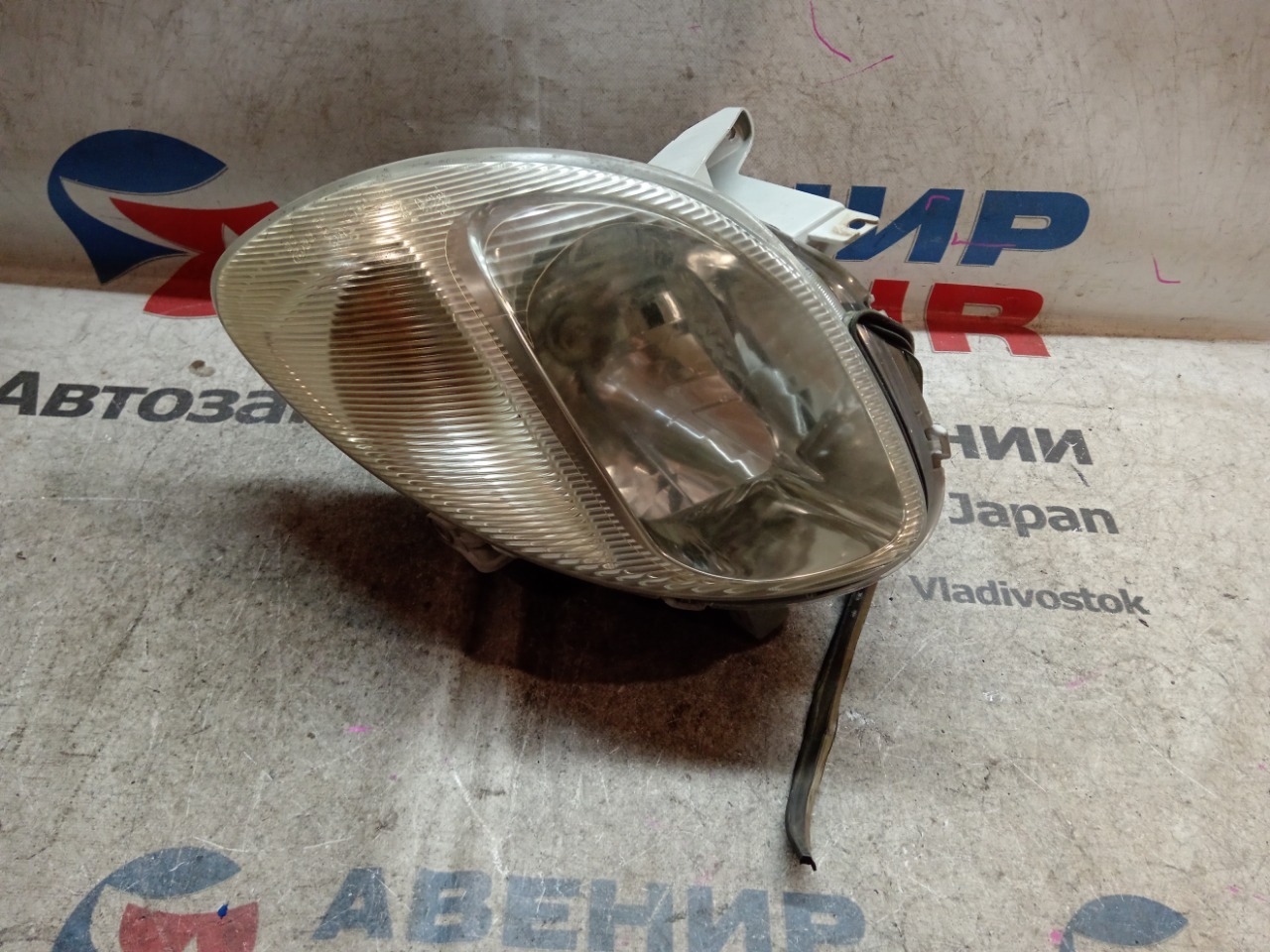 Фара TOYOTA DUET M100A передняя левая (б/у)