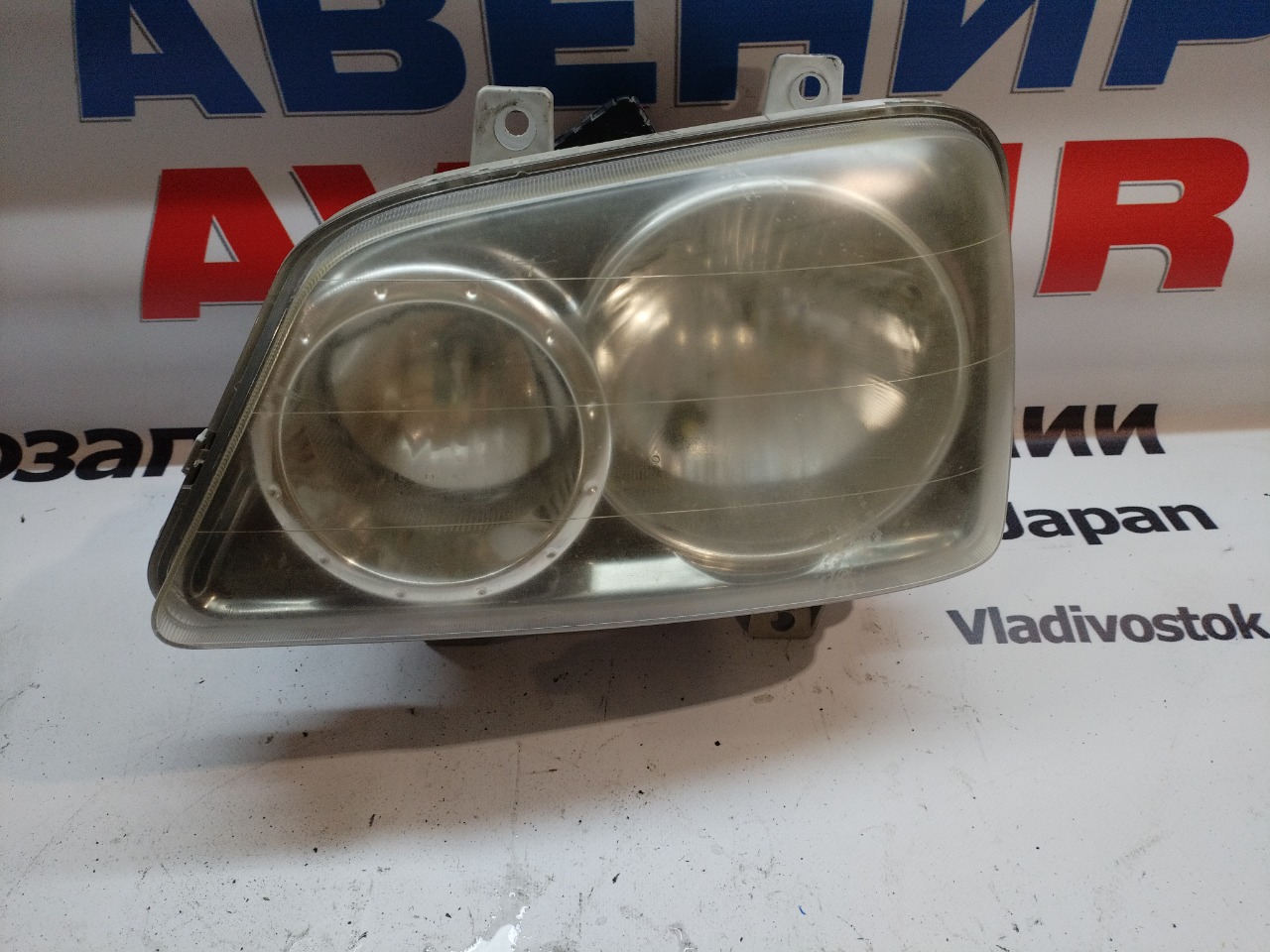 Фара DAIHATSU TERIOS KID J111G передняя левая (б/у)