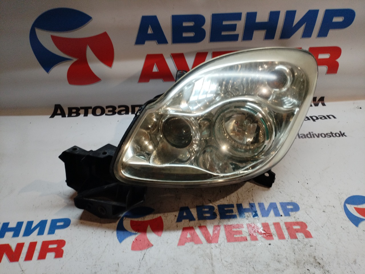 Фара MAZDA VERISA DC5R передняя левая (б/у)