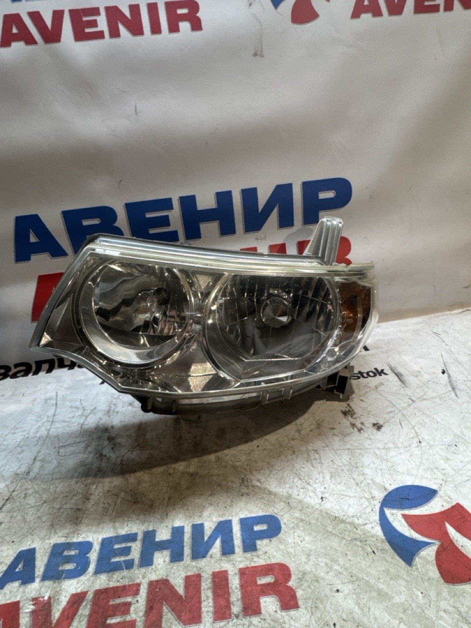 Фара DAIHATSU TANTO L375S передняя левая (б/у)