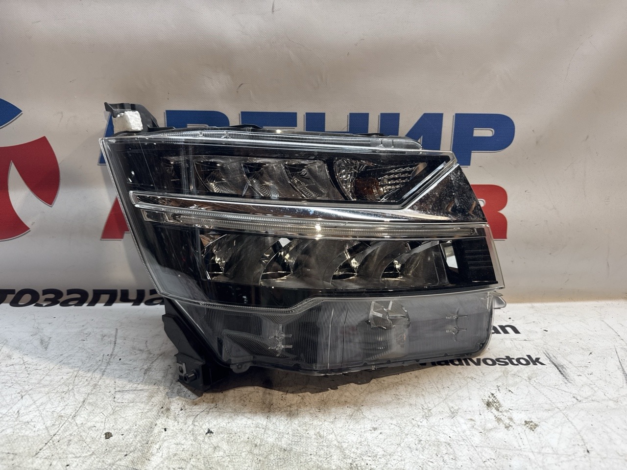 Фара DAIHATSU MOVE LA150S передняя правая (б/у)