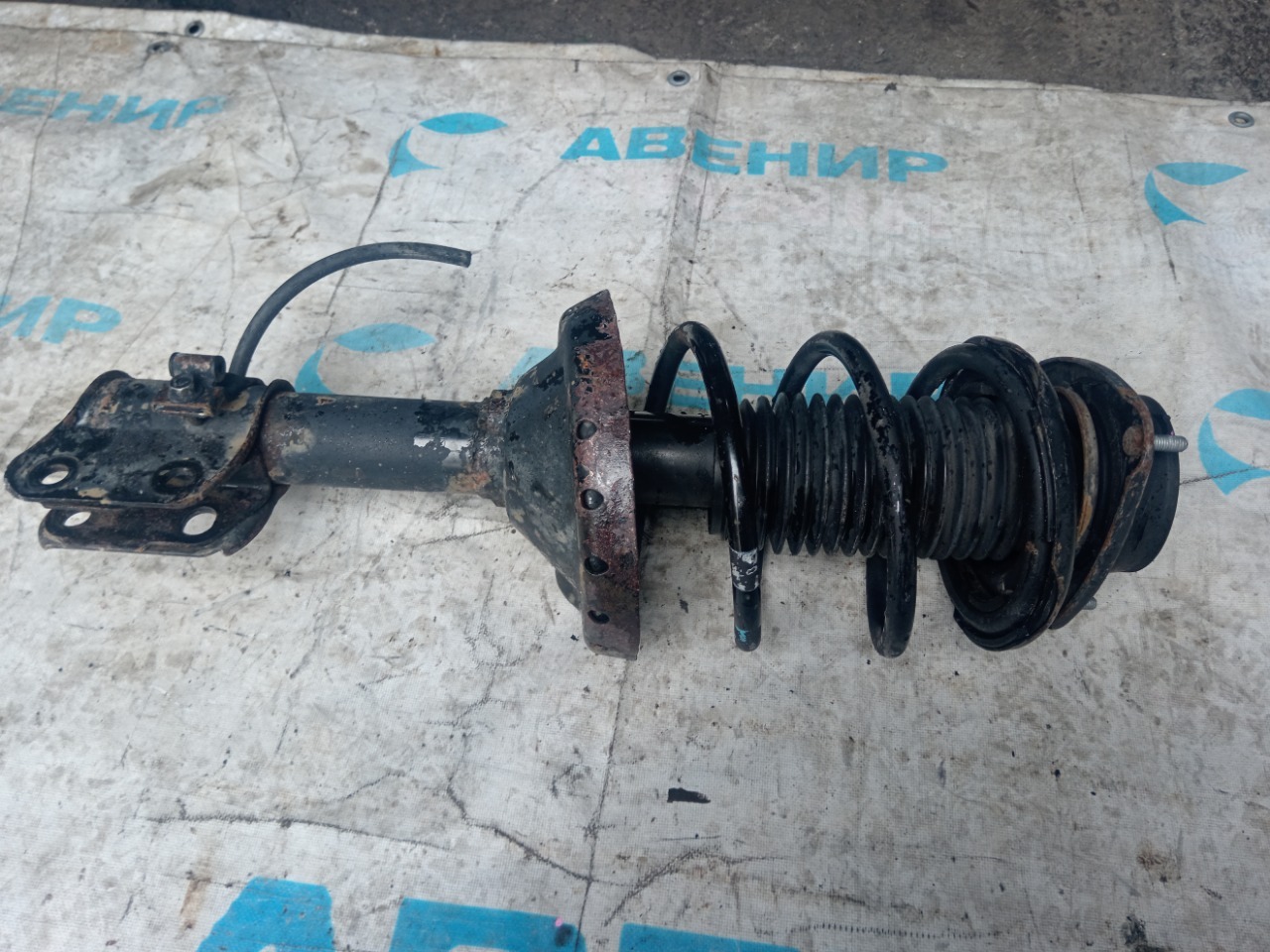 Стойка SUBARU IMPREZA GGD EJ15 передняя левая (б/у)