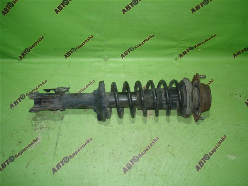 Стойка MAZDA DEMIO DW5W передняя левая (б/у)