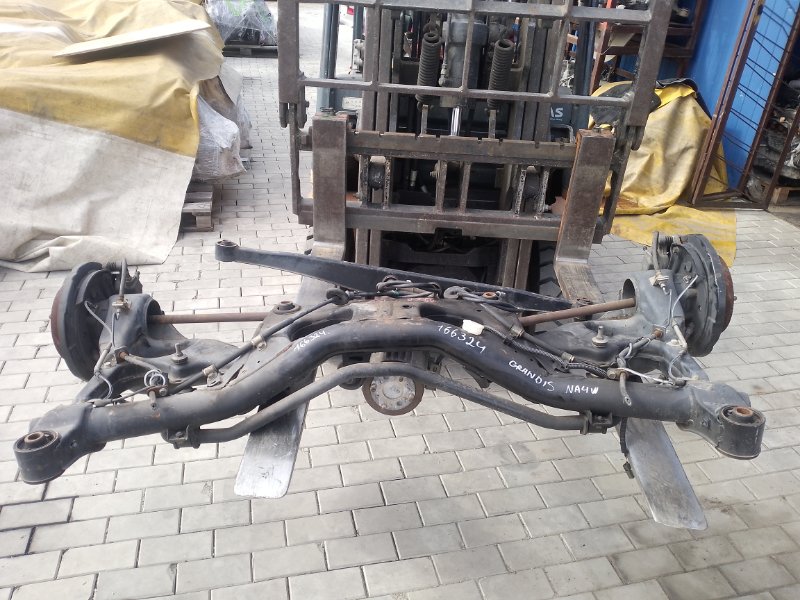 Балка MITSUBISHI GRANDIS NA4W 4G69 2004 задняя (б/у)