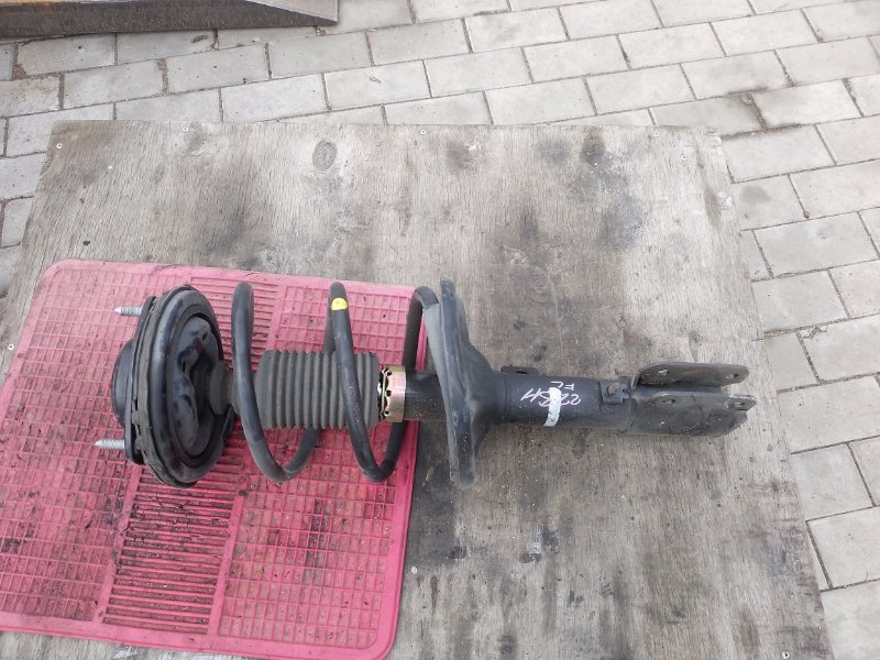 Стойка MITSUBISHI GRANDIS NA4W 4G69 2004 передняя левая (б/у)