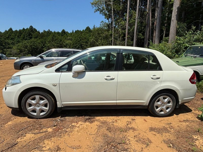 Крыло NISSAN TIIDA LATIO SC11 HR15 2011 переднее левое (б/у)