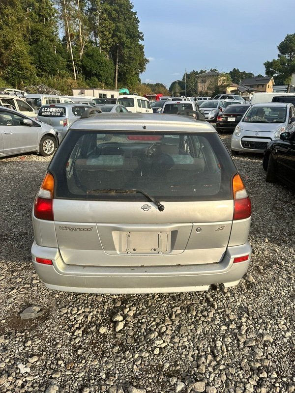 Бампер NISSAN WINGROAD WFY10 GA15(DE) 1997 задний (б/у)