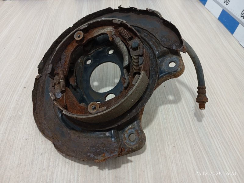 Механизм стояночного тормоза задний левый Mitsubishi Lancer 9 CS3A 4g18