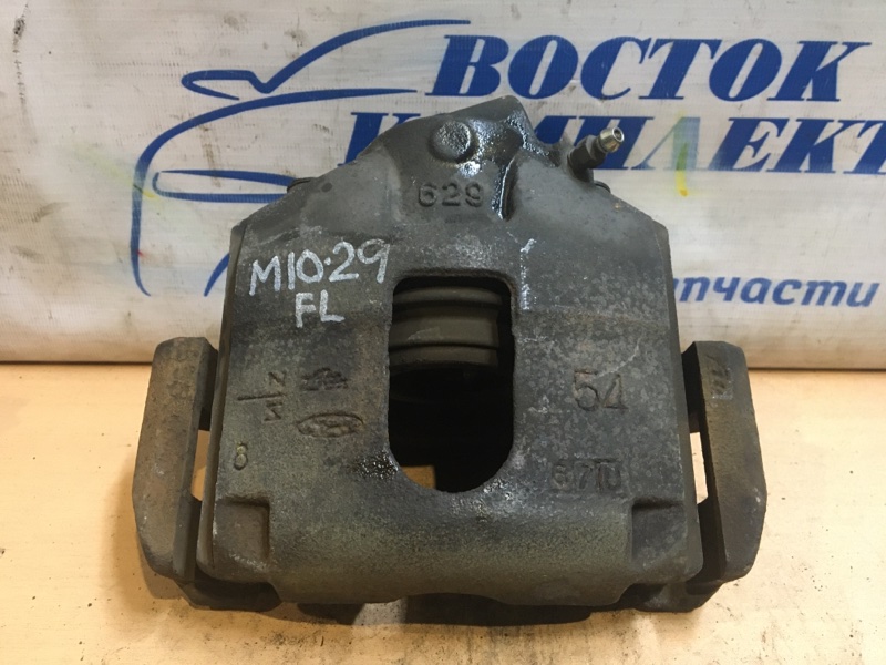 Суппорт Mazda Verisa DC5W ZY-VE перед лев