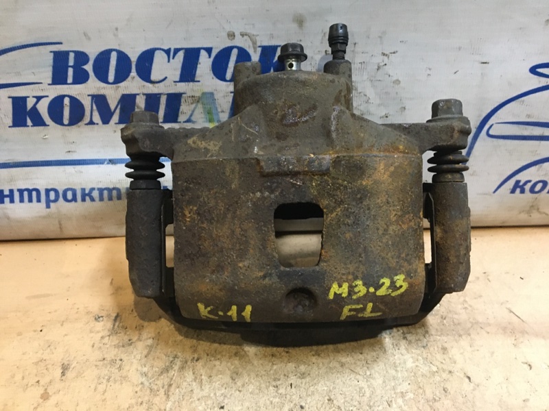 Суппорт Nissan March AK12 CR12DE перед лев