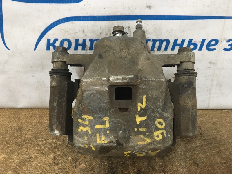 Суппорт Toyota Vitz SCP90 2SZ-FE перед лев