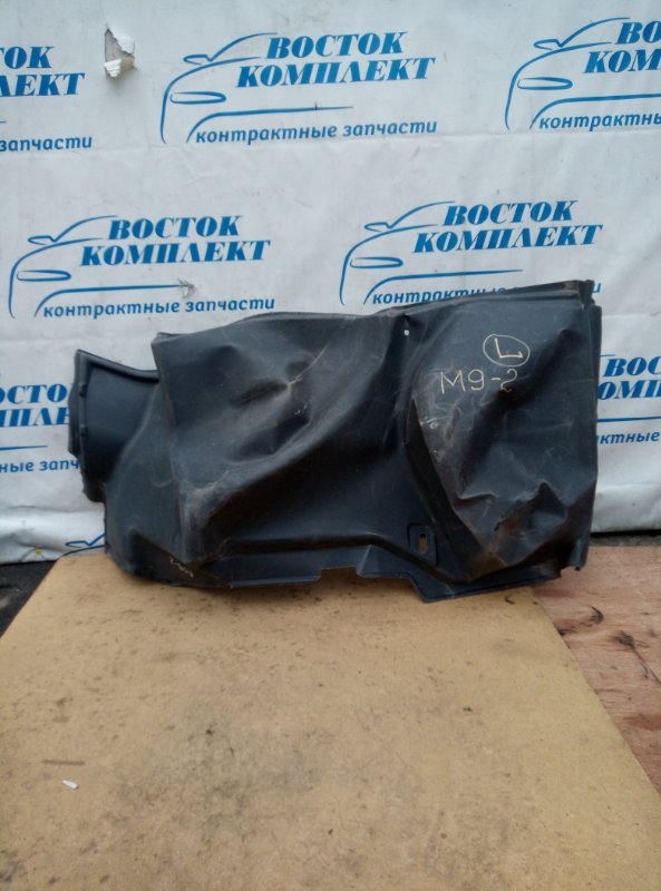 Обшивка багажника Toyota Belta зад лев