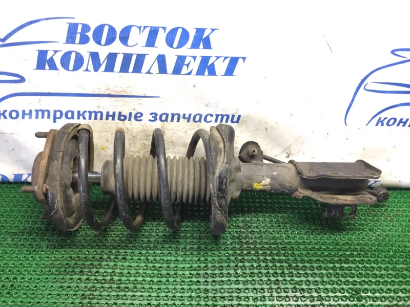 Стойка подвески Mazda Premacy CP8W FP-DE перед лев