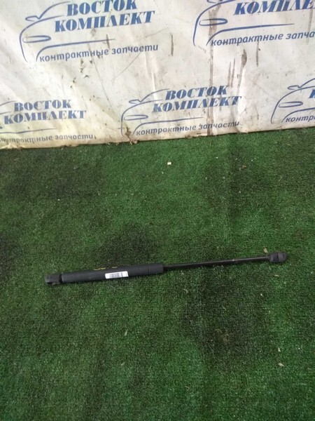 Амортизатор капота Nissan Laurel HC35 RB20DE