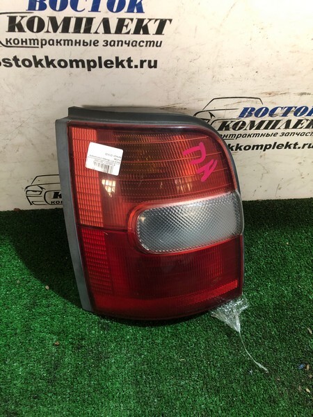 Фонарь стоп-сигнала Nissan March 1998 K11 CG10DE лев