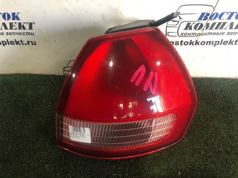 Фонарь стоп-сигнала Nissan Wingroad WFY11 QG15DE прав