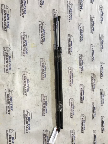 Амортизатор багажника Toyota Sienta 2009 NCP81G 1NZ-FE