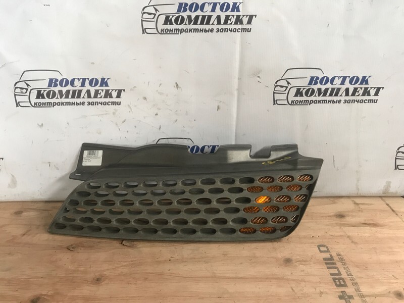 Решетка радиатора Nissan March K12 CR12DE лев