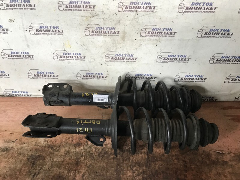 Стойка подвески Toyota Ractis SCP100 2SZ-FE перед