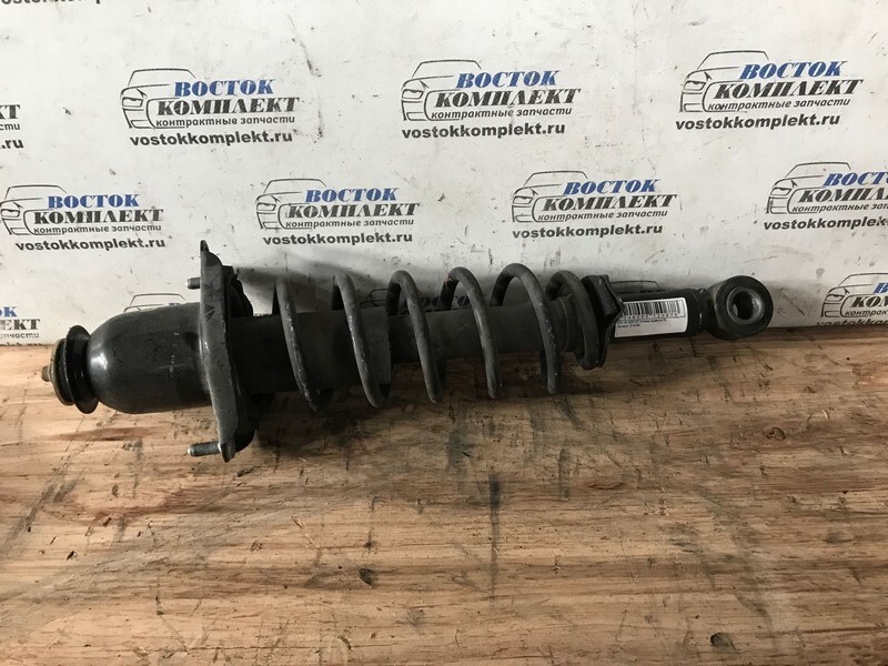 Стойка подвески Toyota Will VS 2002 NZE127 1NZ-FE зад лев