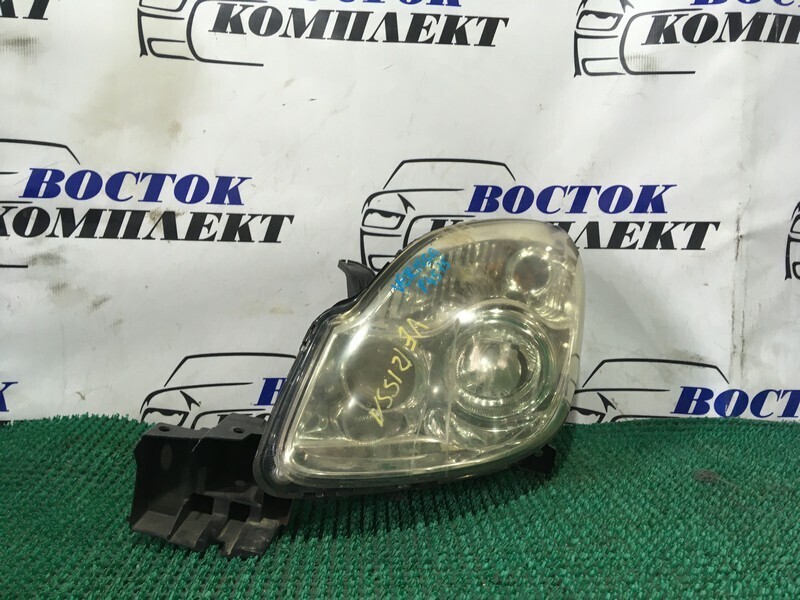 Фара Mazda Verisa DC5W лев