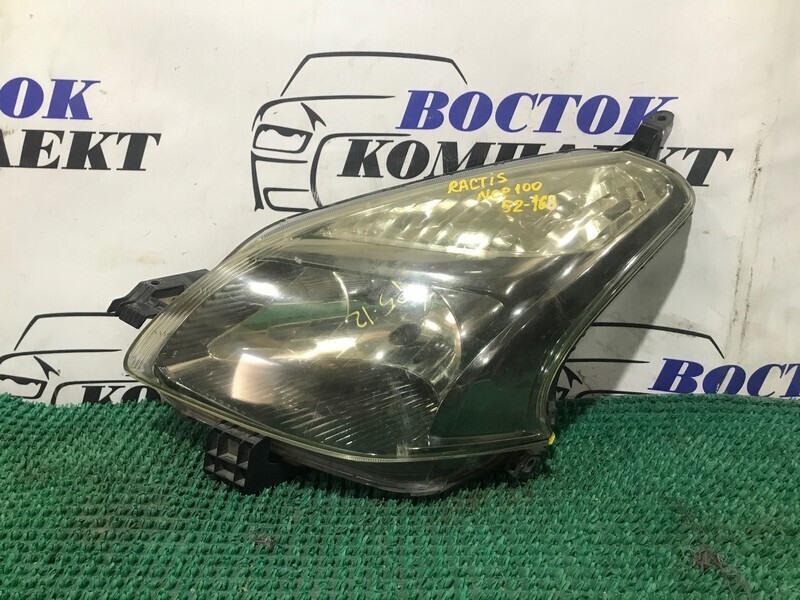 Фара Toyota Ractis NCP100 1NZ-FE лев