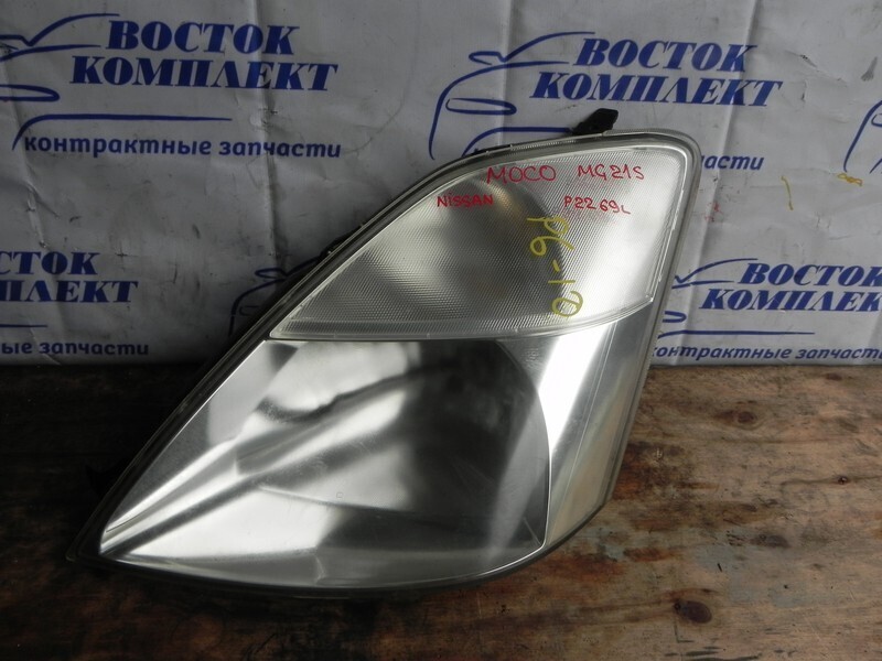 Фара Nissan Moco MG21S K6A лев