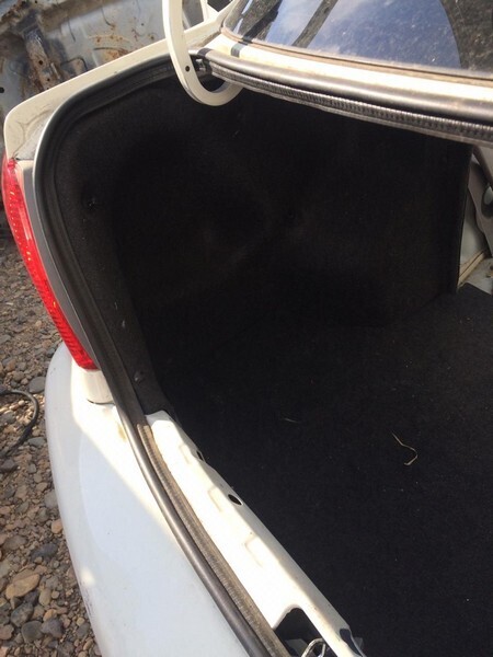 Обшивка багажника Toyota Platz SCP11 1SZ-FE лев