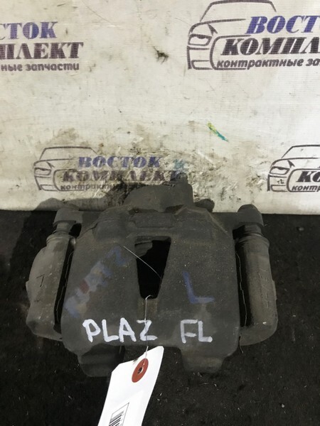 Суппорт Toyota Platz 2002 SCP11 1SZ-FE перед лев