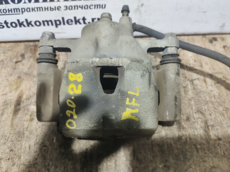 Суппорт Toyota Vitz SCP90 2SZ-FE перед лев