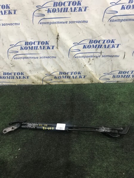 Амортизатор багажника Toyota Wish ZNE14G 1ZZ-FE