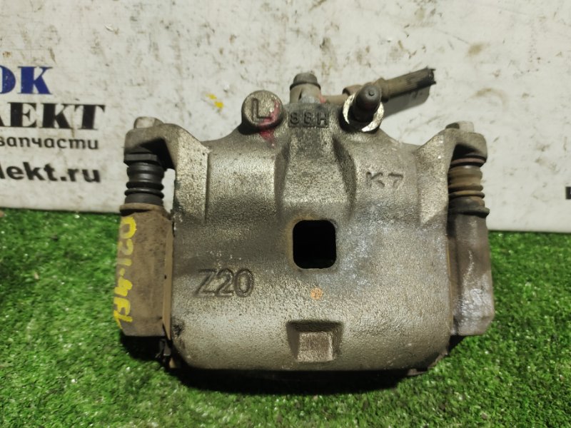 Суппорт Nissan March 2018 K13 HR12DE перед лев