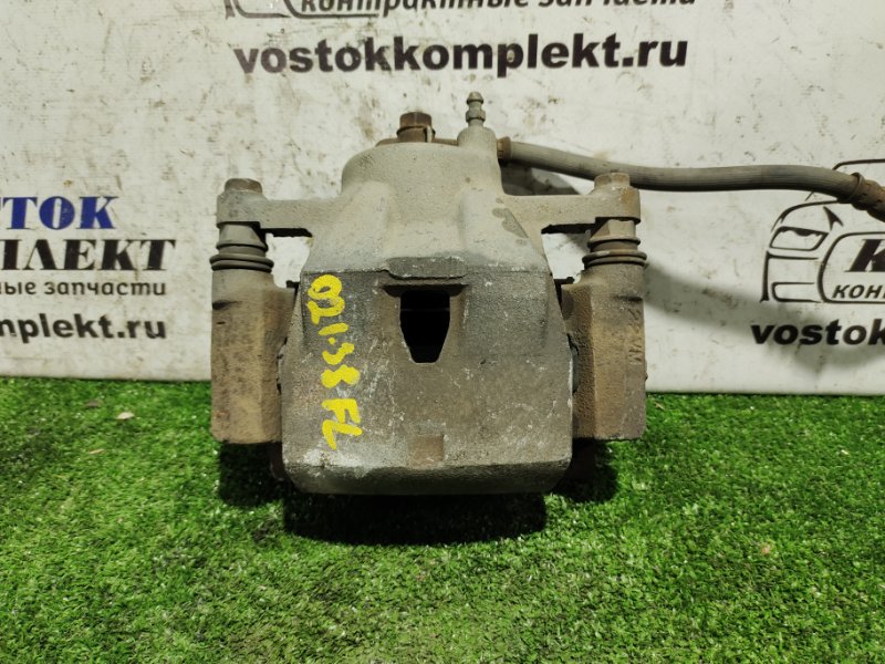 Суппорт Toyota Vitz 2006 SCP90 2SZ-FE перед лев