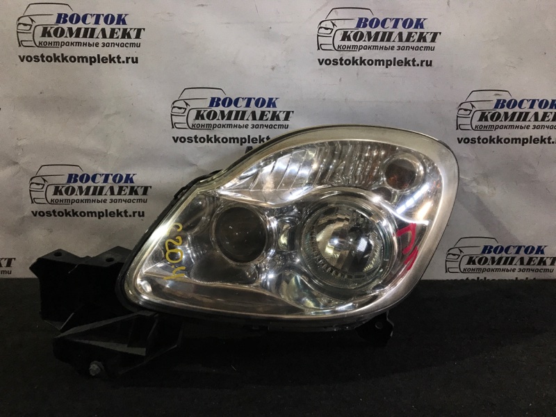 Фара Mazda Verisa 2006 DC5W ZY-VE лев