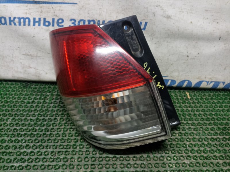 Фонарь стоп-сигнала Mitsubishi Delica D:2 MB15S K12B лев