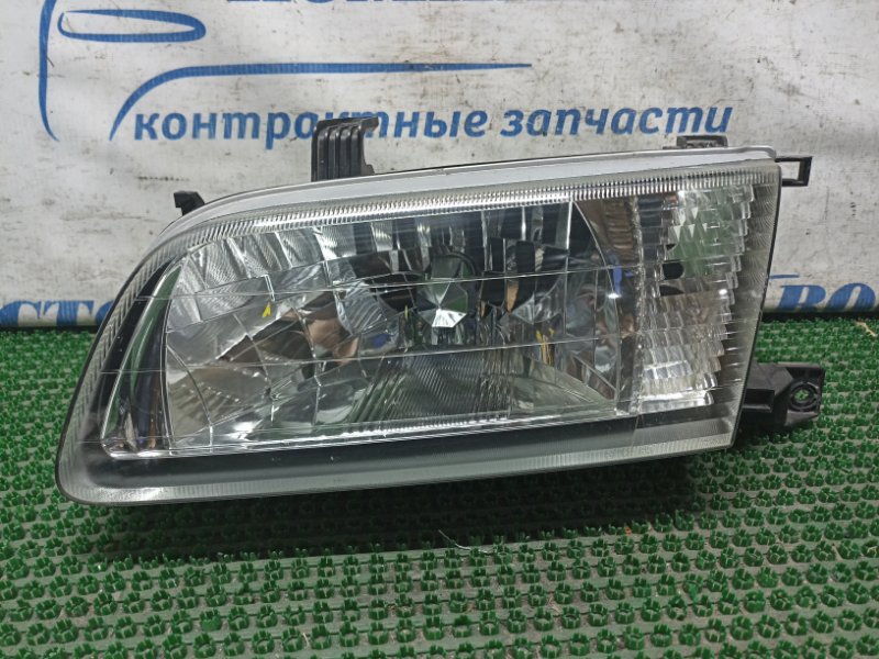 Фара Nissan Sunny FB15 QG15DE лев