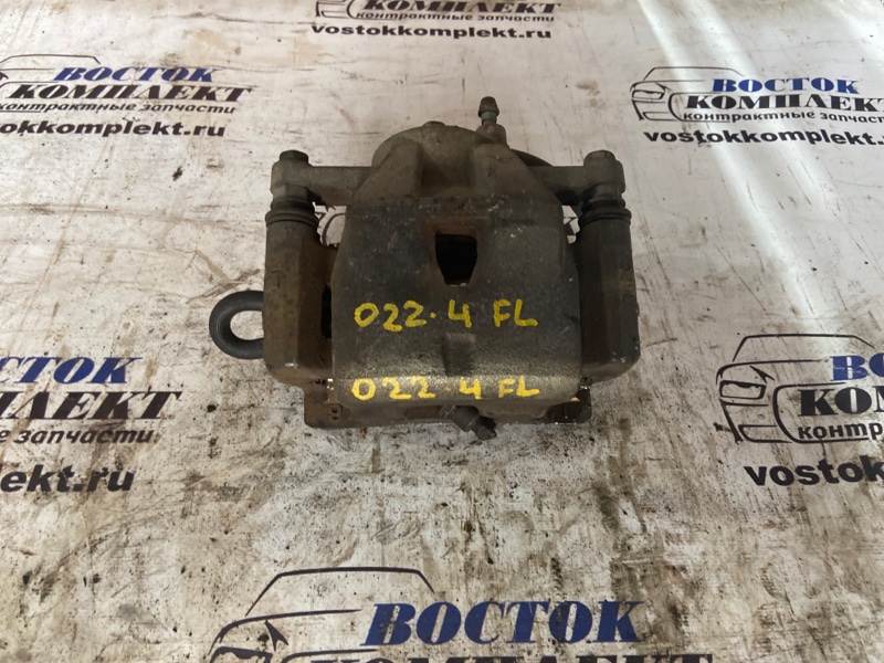 Суппорт Toyota Ractis 2008 SCP100 2SZ-FE перед лев