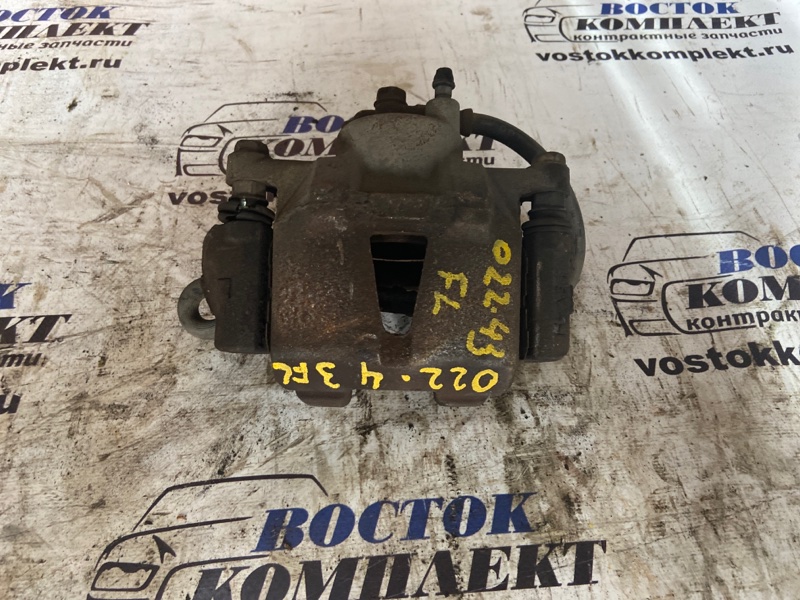 Суппорт Toyota Vitz NCP15 2NZ-FE перед лев