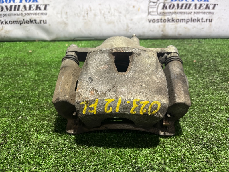 Суппорт Toyota Spade NCP141 1NZ-FE перед лев