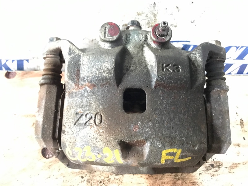 Суппорт Nissan March 2010 K13 HR12DE перед лев