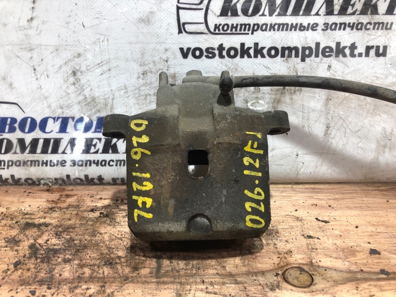 Суппорт Mitsubishi Colt 2009 Z21A 4A90 перед лев