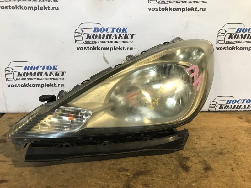 Фара Honda Fit 2011 GE6 L13A лев