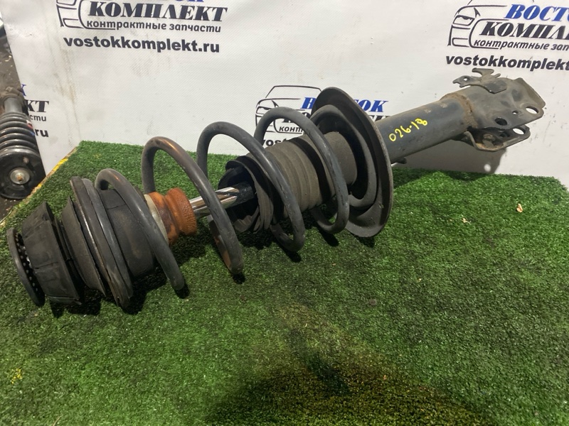 Стойка подвески Toyota Vitz 2007 SCP90 2SZ-FE перед лев